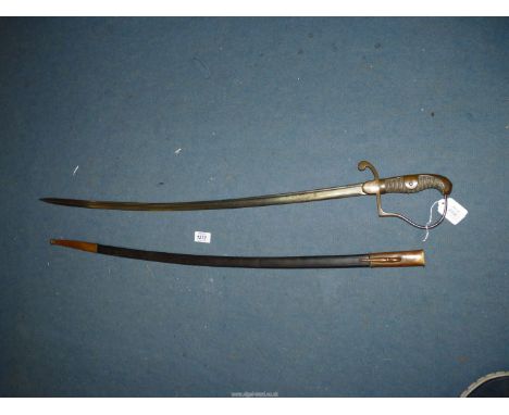 A Prussian Wilhelm 1st Cavalry Sabre with brass stirrup hilt, sharkskin grips and 33" pipe back blade in a brass mounted leat