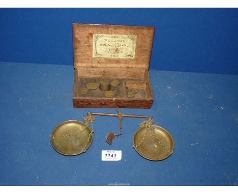 A W&T Avery brass Scale and weights, in original wooden box.