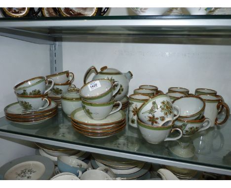 A vintage hand painted Mexican stoneware tea set and mugs by celebrated artist Ken Edwards circa 1974, includes teapot, ten t