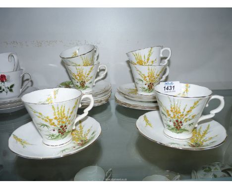 A Royal Stafford 'Broom' tea set, six cups and saucers and six tea plates.