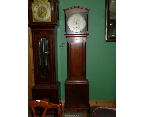 An unusual and desirable Mahogany cased longcase clock, the 12 1/2" diameter circular silvered face having a sweep minute han