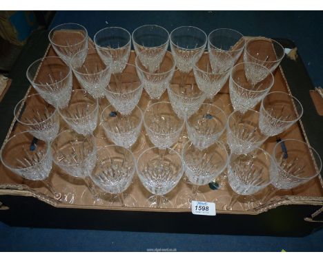 A set of thirteen red wine glasses and matching set of fourteen white wine glasses.