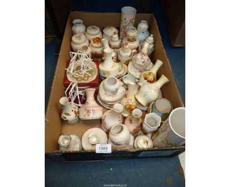 A large quantity of Royal Worcester Palissey trinket dishes, small tobacco jars with lids, vases, stemmed vases, cups, etc.