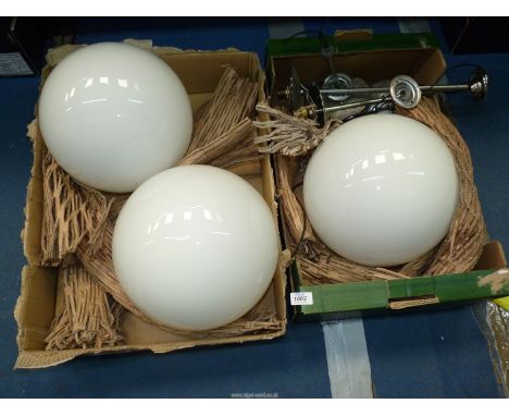 Three spherical opaque glass light shades with four light fittings 10" diameter.