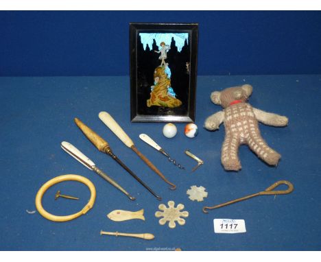 A small quantity of miscellania including button hooks, two Mother of Pearl Chinese counters,a minature Mother of Pearl penkn