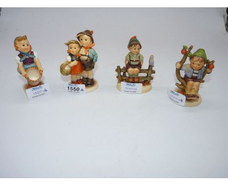 Three Goebel figures to include; Hansel & Gretel, apple tree boy/girl with basket and boy sat on a fence. All approx 4" tall.