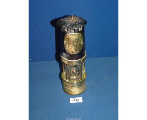 A metal and brass Miner's lamp by Hailwood & Ackroyd no. 1149.