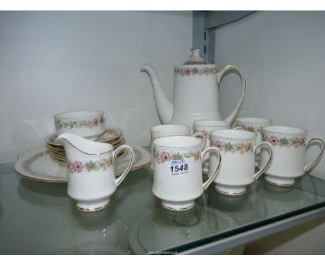 A Paragon 'Belinda' coffee set to include; coffee pot, sugar bowl, milk jug, sandwich plate and six coffee cans and saucers, 