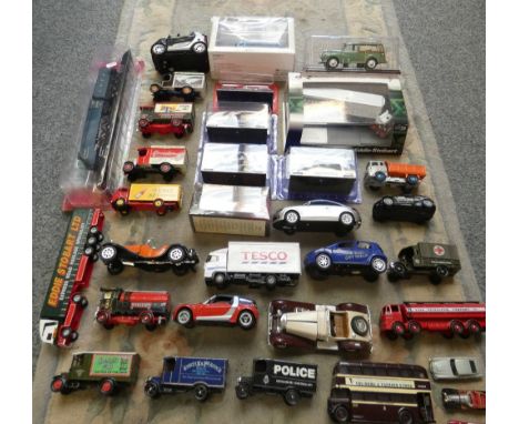 Boxed and unboxed models including Corgi, Dinky.  Boxed model of a Mallard steam engine, Morris Minor 1000 traveller, Eddie S