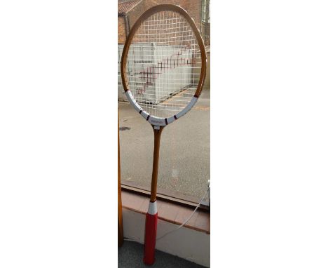 *A super-sized sports shop promotional item tennis racket, 182 cm tall