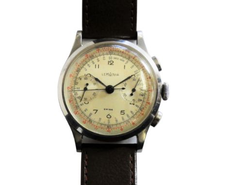 A gentleman's Lemania chronograph wristwatch, circa 1940's, with dual buttons, three outer tracks, subsidiary dials at three 