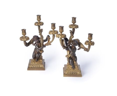 A pair of fine gilt and patinated bronze three light figural candelabra in late Louis XV taste, by Henri Vian (French, 1860-1