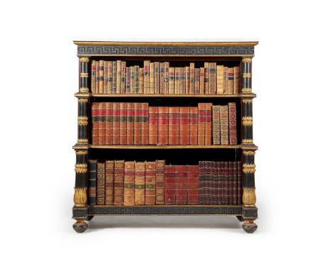 A Regency mahogany, ebonised and parcel gilt open ‘waterfall’  bookcase, circa 1815, the mottled white marble top above a Gre