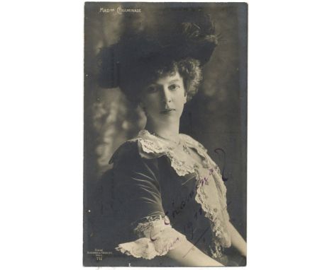 CHAMINADE CECILE: (1857-1944) French Composer and Pianist. Vintage signed postcard photograph of Chaminade seated in a half l