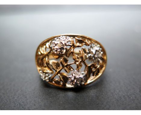 A 9ct gold openwork panel ring with diamond highlights - Hallmarked Birmingham - Ring size M - Weight approx 3.1gms
Condition