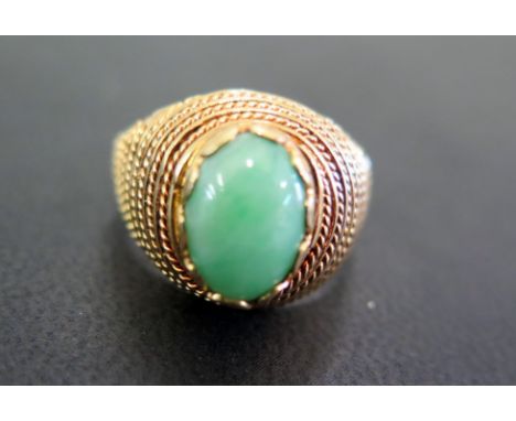 A jade single-stone ring - Stamped 750 - Ring size R - Weight approx 8.0gms
Condition Report: Good - Jade untested for natura