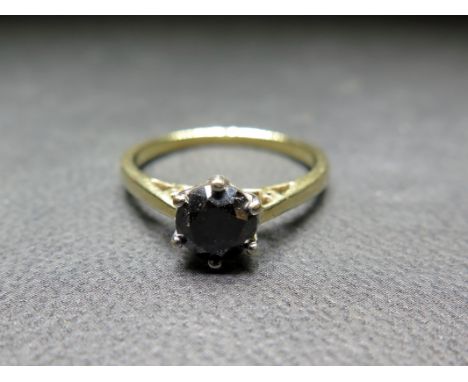 A 9ct gold black diamond single-stone ring - Hallmarked London - Ring size P - Weight approx 2.6gms
Condition Report: Good - 