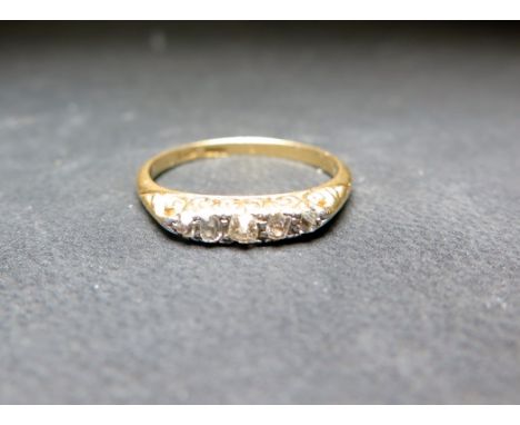 An old-cut diamond five-stone ring - Stamped 18ct - Ring size P 1/2 - Weight approx 3.1gms
Condition Report: Good - With ligh