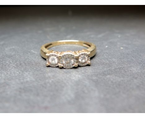 A 9ct gold diamond illusion-set ring - Diamond weight 0.25ct, stamped to band - Hallmarked Sheffield - Ring size O - Weight a