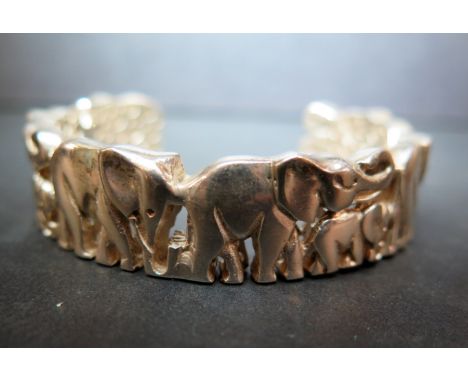 A silver elephant cuff bangle - Hallmarked Birmingham - Weight approx 1.7ozt
Condition Report: Good - With light surface scra
