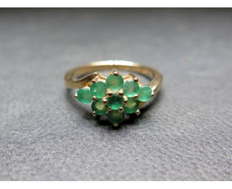 A 9ct gold emerald cluster dress ring - Hallmarked Birmingham - Ring size K - Weight approx 2.2gms
Condition Report: Good