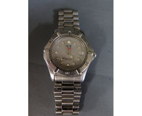 A 1998 Tag Heuer 2000 series quartz mid size stainless steel wristwatch with a 38mm case - having matt silver dial with dot m