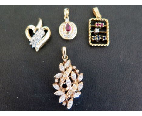An assortment of three diamond and gem-set pendants - Together with a further pendant set with marquise-cut cubic zirconia - 