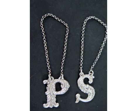 Two Victorian silver decanter labels for Port and Sherry with ornate acanthus decoration both with makers marks for AGW, one 