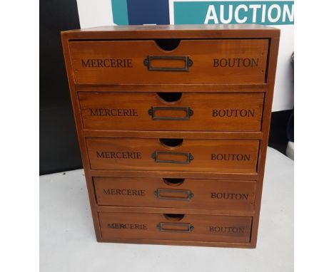 A reproduction French haberdashery type table-top chest of 5 drawers containing various collectables and antiquities includin
