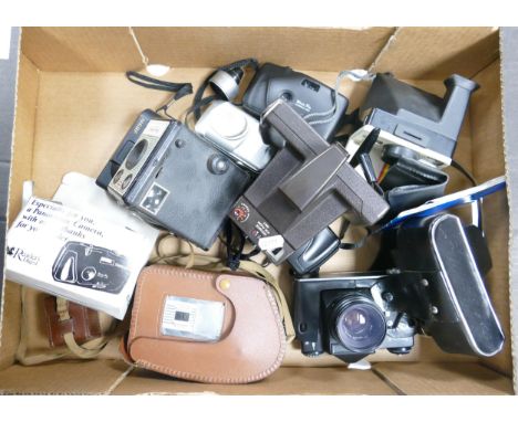 A collection of cameras to include Zenit - E camera, Polaroid 1000, Kodak Brownie 8mm movie camera, Panorama wide picture pan