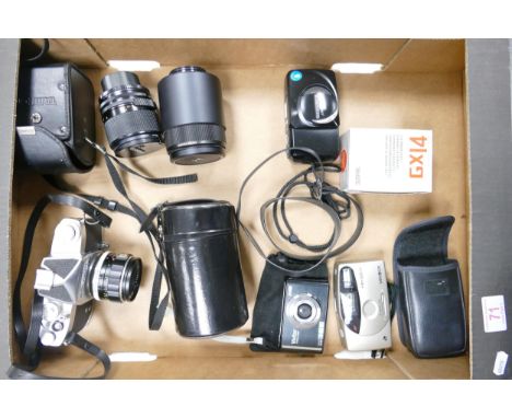 A collection of cameras and lenes to include Minolta Vectis 100BF, Vivitar vivicam 8225, Soligoa TM, Tamron 35-70mm, Sigma f-