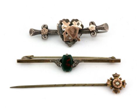 A hallmarked silver and gold brooch, a 9ct gold pearl set stick pin and a further yellow metal bloodstone set brooch.