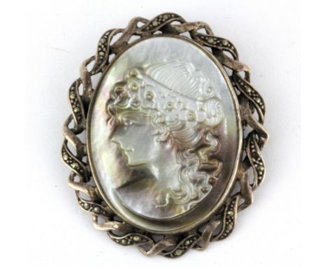 A 925 silver and marcasite brooch set with carved mother of pearl,  5 x 4.2cm.