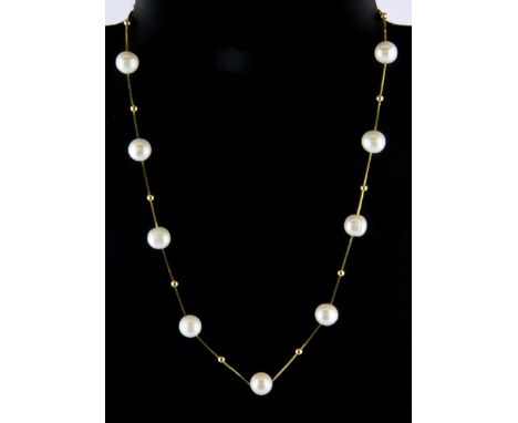 A silver gilt and cultured pearl necklace, pearl size 9.5mm necklace L. 42cm.