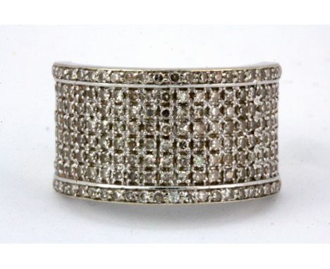 An 18ct white gold diamond pave set ring, approx. 1ct overall, (K), W. 7.2g.