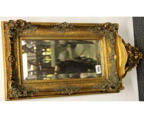 A gilt mirror shelf, H. 67cm.