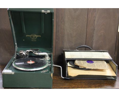 A Columbia portable record player and 78 rpm records.