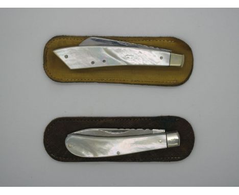Pocket Knives - A mother of pearl scaled knife stamped "Oates" to tang, with brass bolster linings, workback to spine and bla
