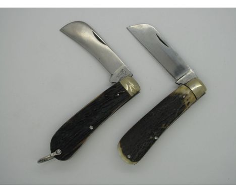 Pocket Knives - W.H. Wragg of Sheffield, stag handle with brass bolster, 18cm open; Humphrey's of Sheffield, with stag handle