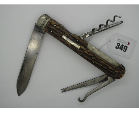 A Pocket Knife by Thomas Smith, Sheffield, multi-tool, comprising 12cm blade, corkscrew, awl, button hook, saw, part workback