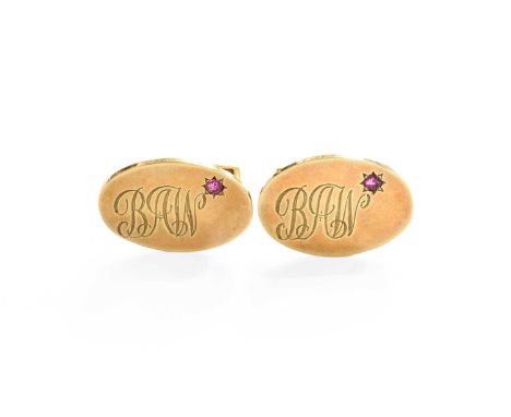 A Pair of 9 Carat Gold Ruby Cufflinks, the oval plaques engraved with initials BAW, with round cut ruby detailing and swivel 