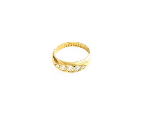 An 18 Carat Gold Diamond Five Stone Ring, the graduated old cut diamonds in yellow claw settings, to a plain polished shank, 