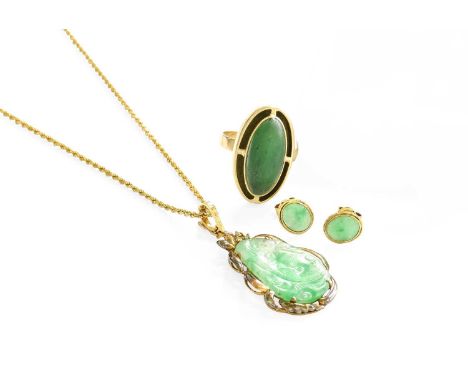 A Jade and Diamond Pendant on Chain, the irregular shaped carved and pierced jade plaque with an eight-cut diamond surmount, 