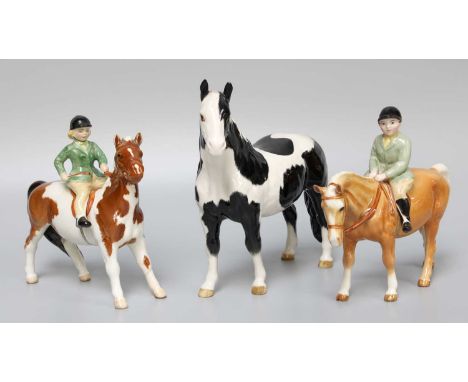 Beswick Girl on Pony, model number 1499, skewbald gloss, and Boy on Pony, model number 1500, palamino gloss, and Pinto Pony, 