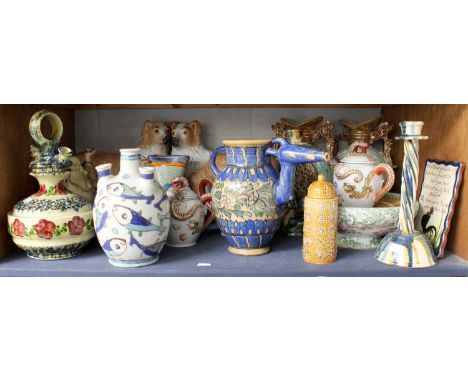 A Shelf of Decorative Ceramics, including Isnic style vases and vessels, a pair of twisted candlesticks, a pair of Continenta