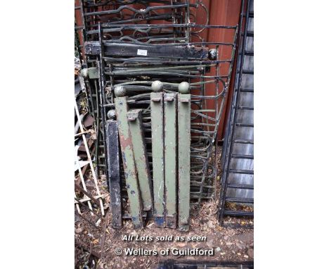 LARGE RUN COMPRISING FIVE MIXED SIZED SECTIONS OF DECORATIVE WROUGHT IRON RAILING, TOGETHER WITH SEVEN ASSOCIATED POSTS