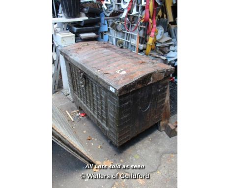 LARGE RUSTIC STYLE STRAPWORK METAL BOUND TRUNK ON WHEELS, 1370 X 780 X 1010