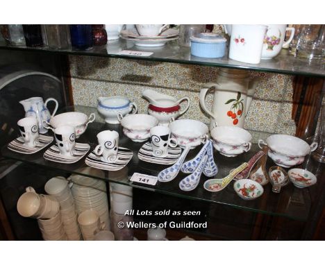 SHELF OF MIXED DECORATIVE ITEMS INCLUDING PORCELAIN WARES AND ORIENTAL SPOONS