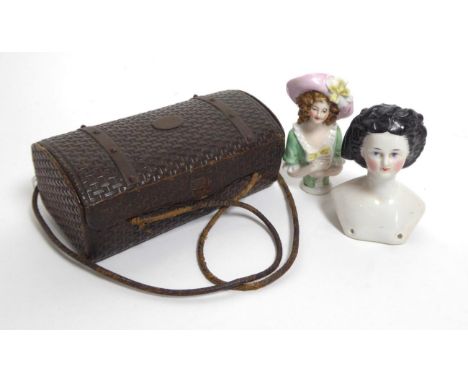 Late 19th Century Moulded Leather Basket, with two carrying handles, enclosing some sewing tools, 14.5cm by 6cm by 7cm; China