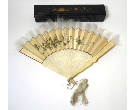 A 19th Century Chinese Pierced Ivory Fan, with carved sticks and guards, cream paper mount hand painted with European style f